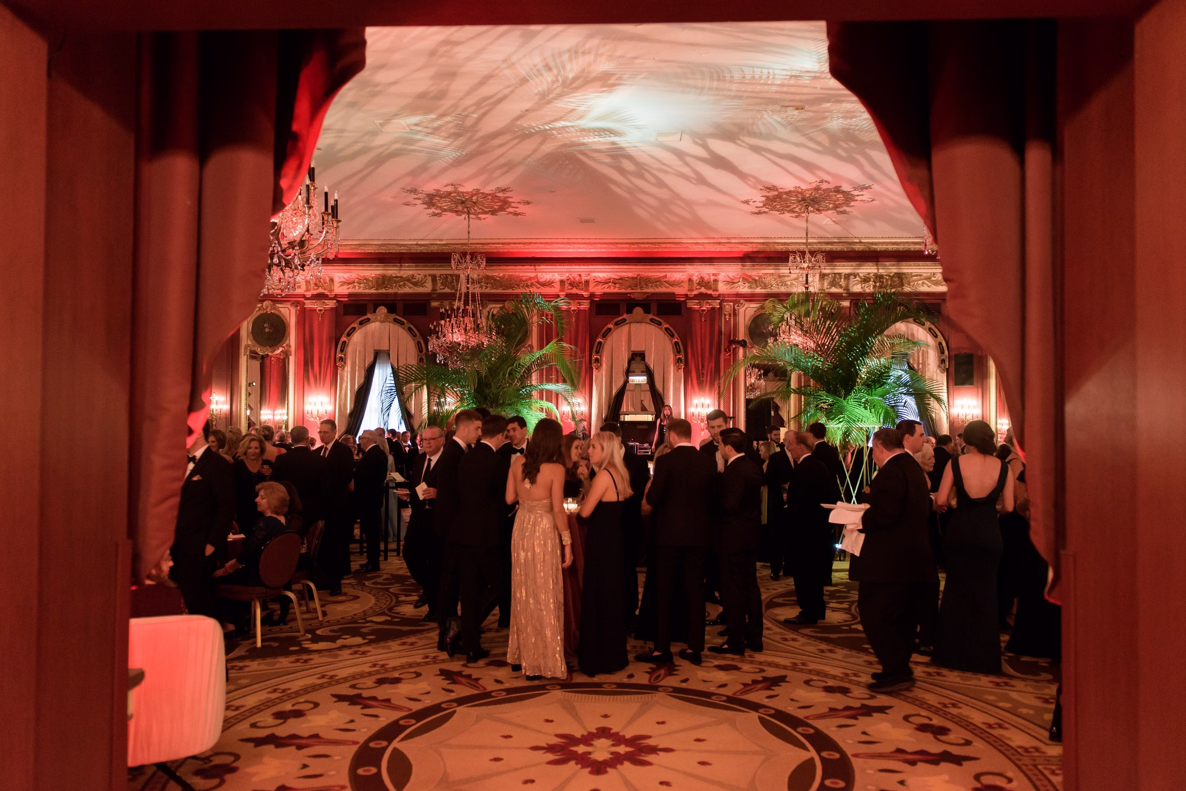 Elegant ballroom wedding reception with ornate architecture and formal guests designed by Chicago wedding designer Erin McDonald