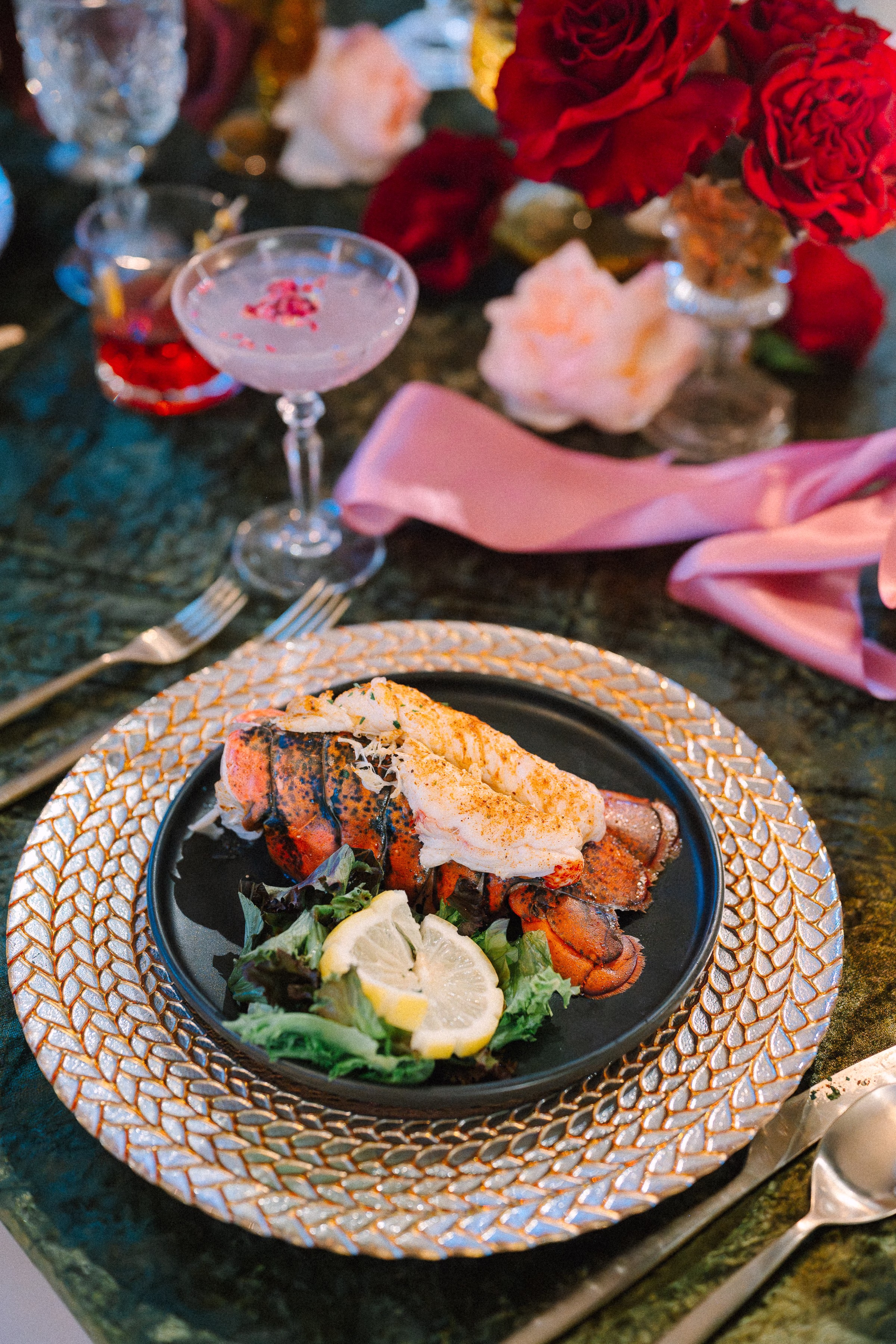 Elegant lobster dinner with romantic floral centerpiece