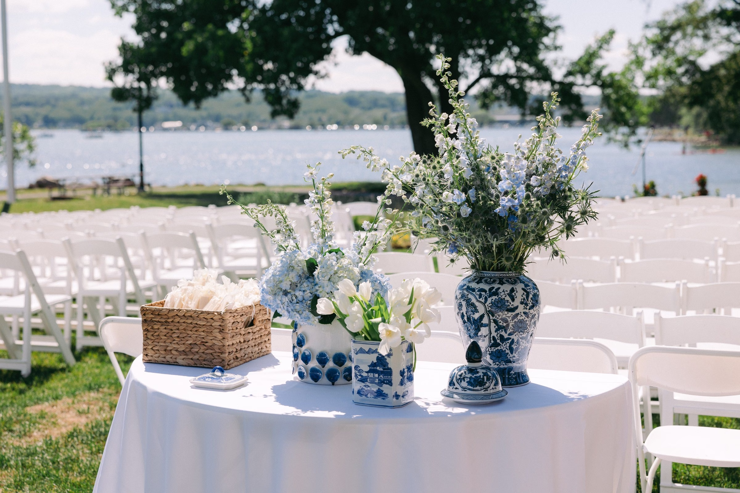 rochester ny wedding design lakeside ceremony blue white florals - Destination Event Design Elegant lakeside wedding ceremony design featuring blue and white floral arrangements and chinoiserie vases by Rochester NY wedding designer Erin McDonald